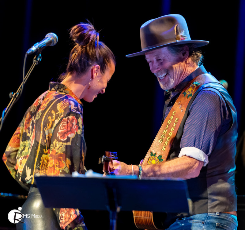 Barney Bentall performing on stage