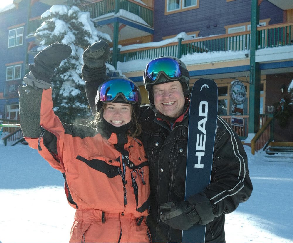 Hali and Greg at a ski lodge during the Skadi Tour