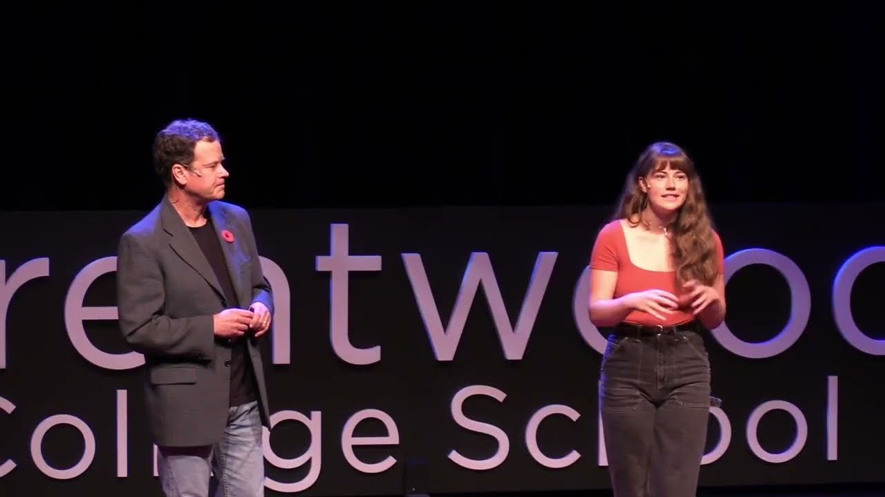 Greg and Hali presenting at a school